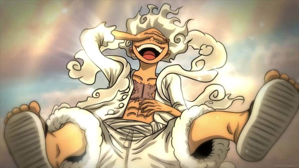 Monkey D. Luffy com cabelos brancos e aura de fumaça sorrindo na forma Nica Gear 5 durante combate. Blog RadarPratico